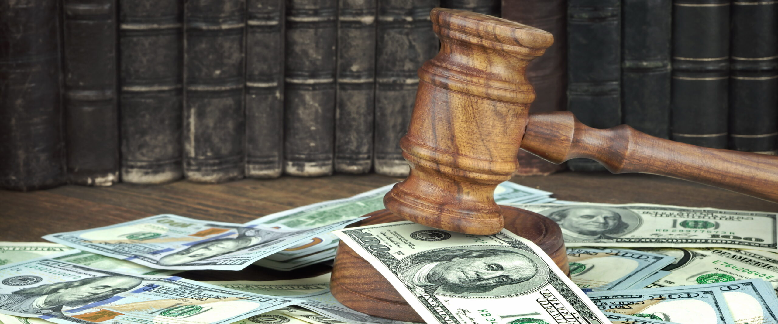 Auction Or Trial Concept With Judges Gavel And Money Heap judgment lien