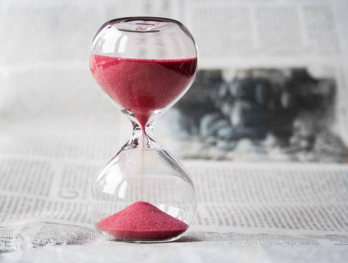pexels-pixabay-39396 Closeup of an hourglass with red sand