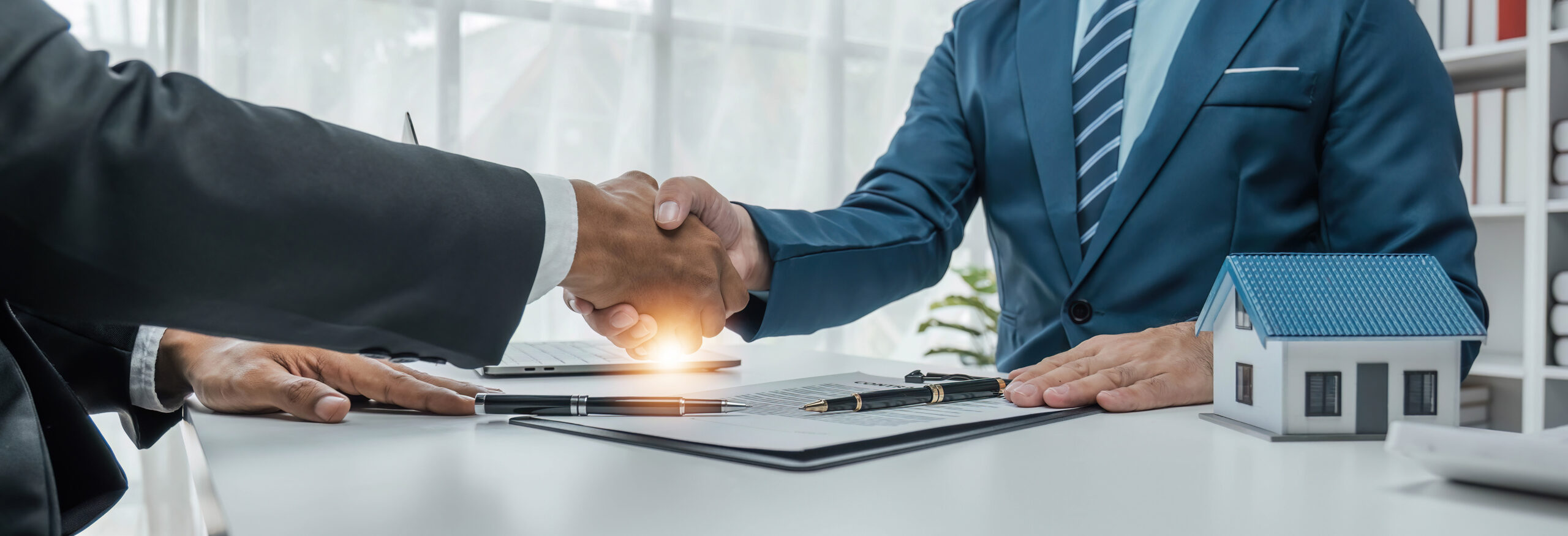 AdobeStock_595650377 piggy bank and model house symbolize guaranteed home equity loan with bad credit in florida