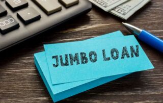 jumbo loan limit florida sticky note next to computer keyboard